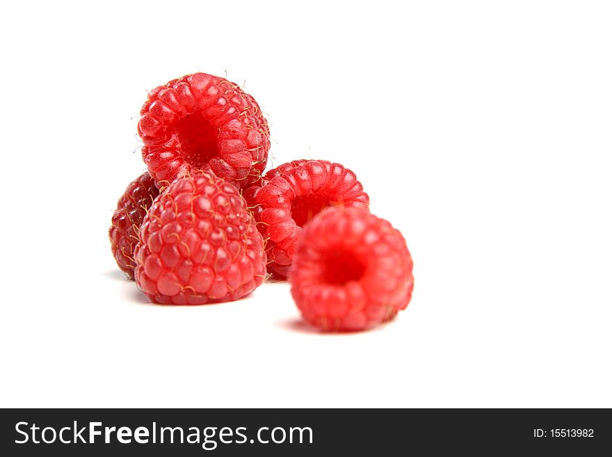 Bunch of raspberries on white background