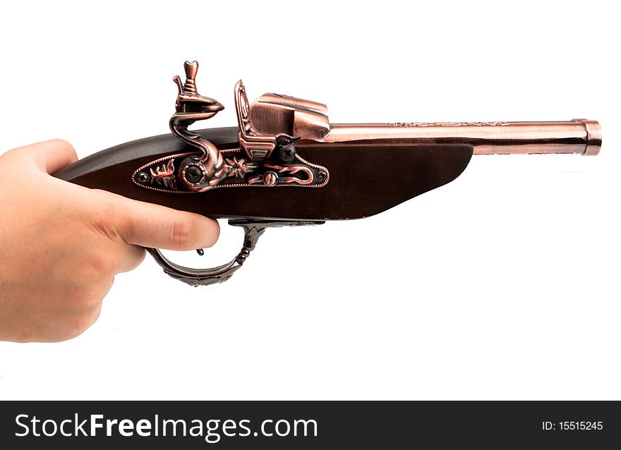 Souvenir pistol on a white background