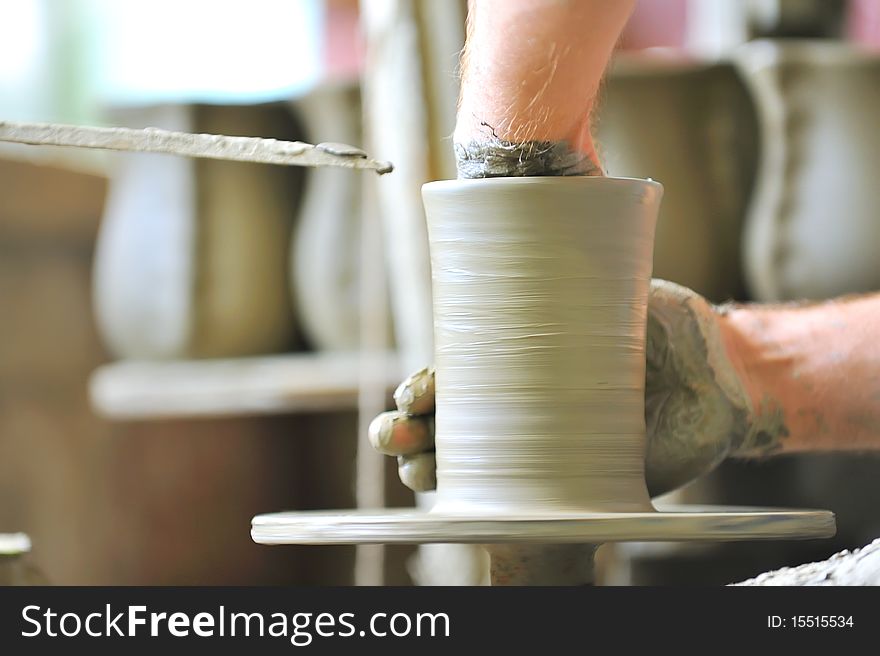 Making of a ceramic vase inside of workshop