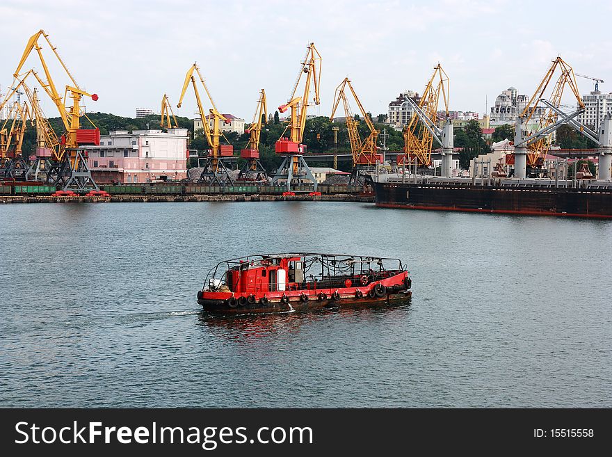 Image of moving boat in water area of port. Image of moving boat in water area of port