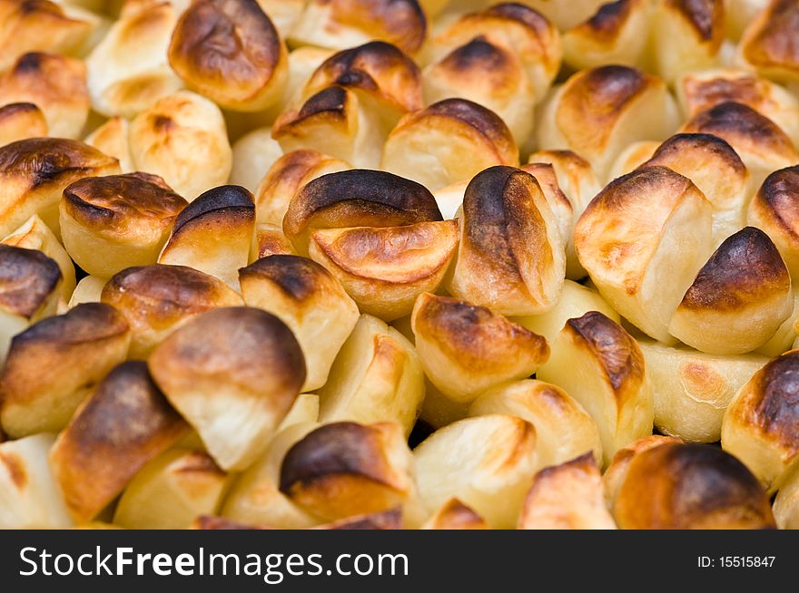 Baked on baking tray potato in oven. Baked on baking tray potato in oven