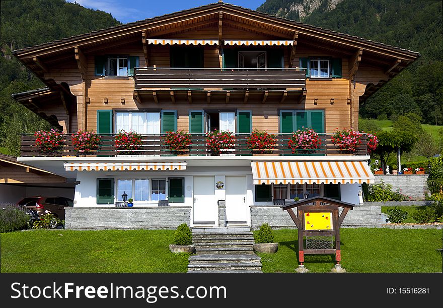 A tipical swiss house in the summer