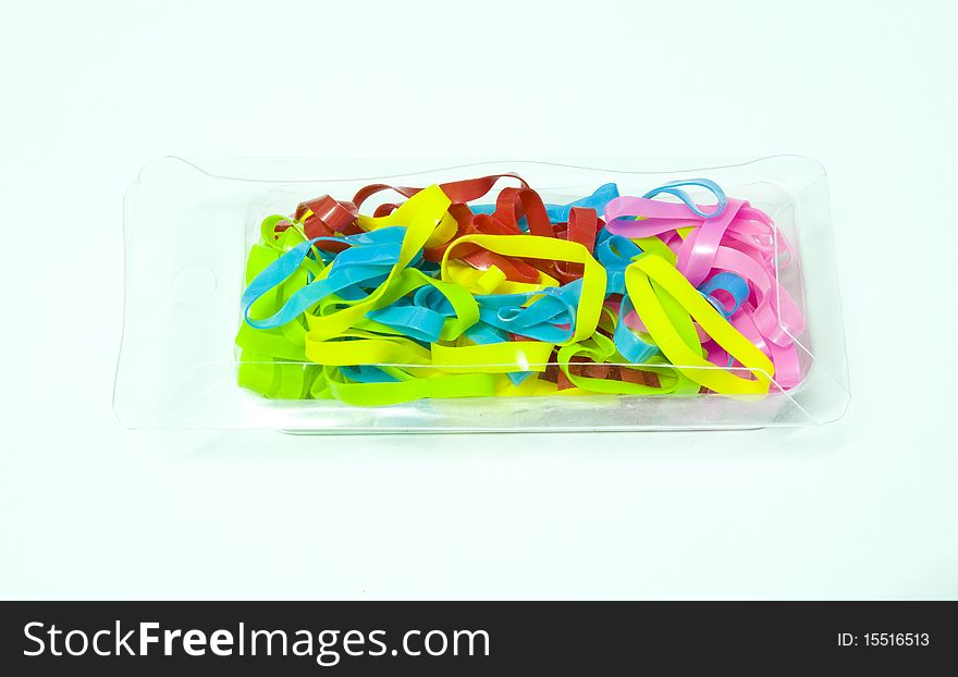 Meny rubber bands on white background