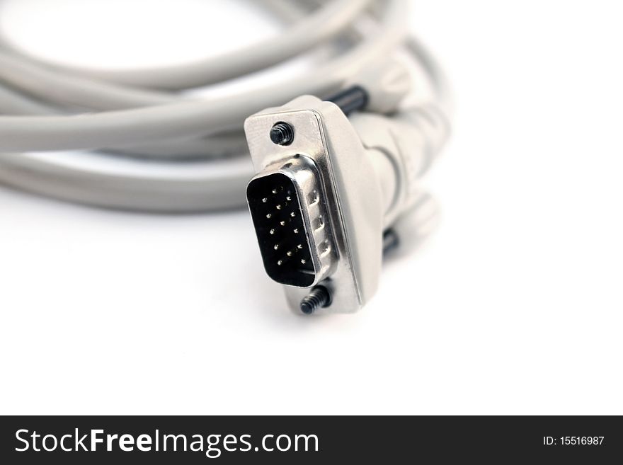 Gray vga monitor cable isolated over white background. Gray vga monitor cable isolated over white background