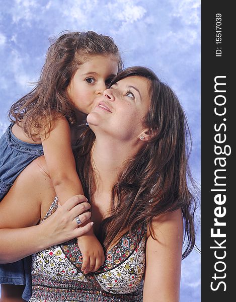 Mother and daughter playing on a studio session