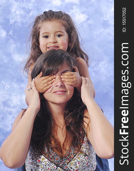 Mother and daughter playing on a studio session