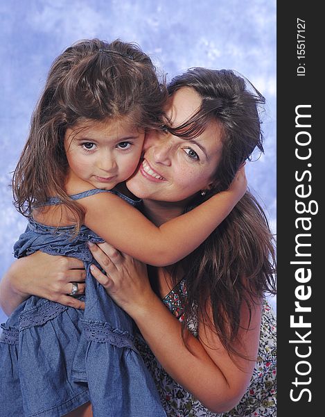 Mother and daughter playing on a studio session