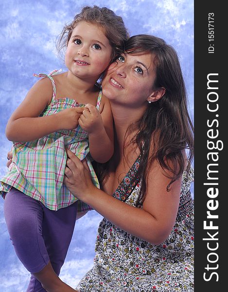 Mother and daughter playing on a studio session