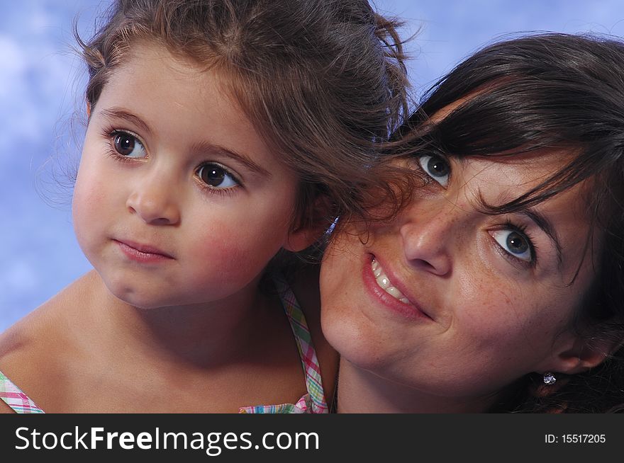 Mother and daughter playing on a studio session