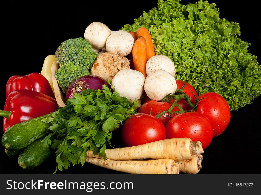Various vegetables on the black background