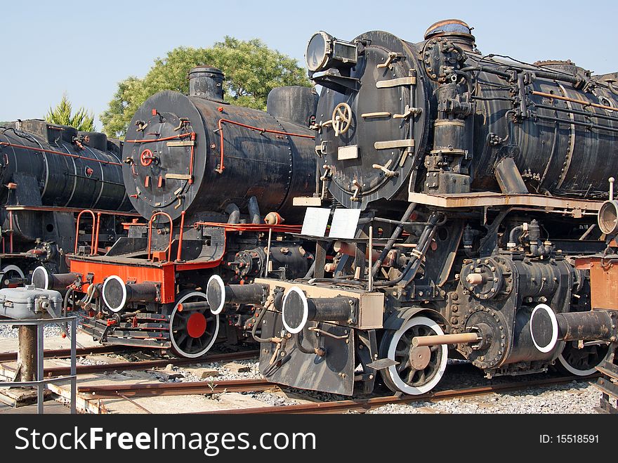 Locomotives waiting in outdoor depot. Locomotives waiting in outdoor depot