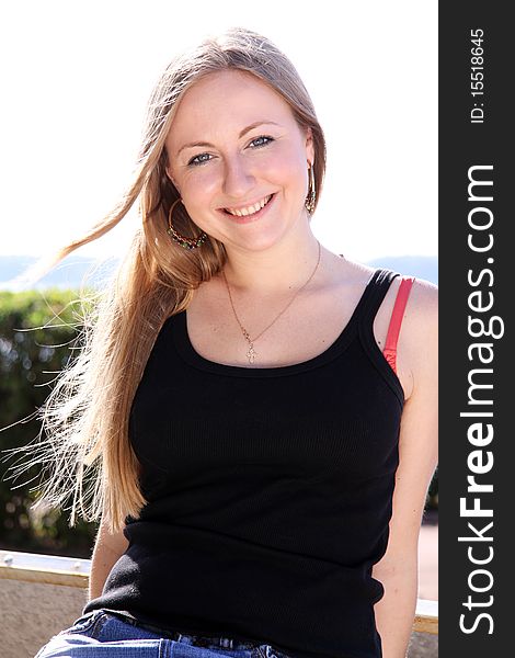 Beautiful young girl smiling. Outdoor portrait