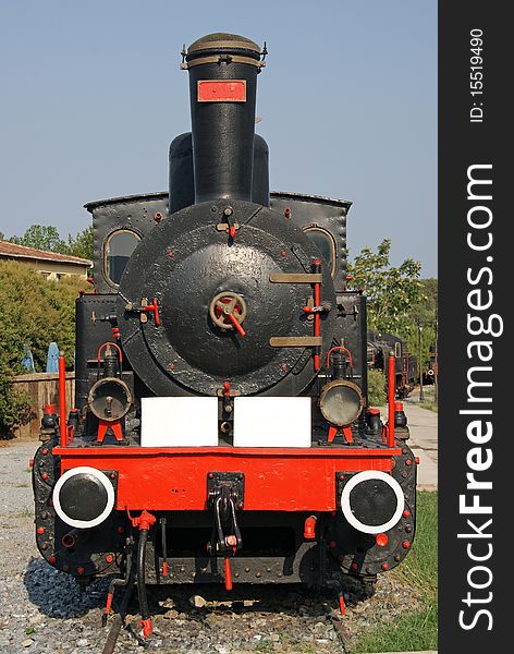 Front ancient locomotive using steam power