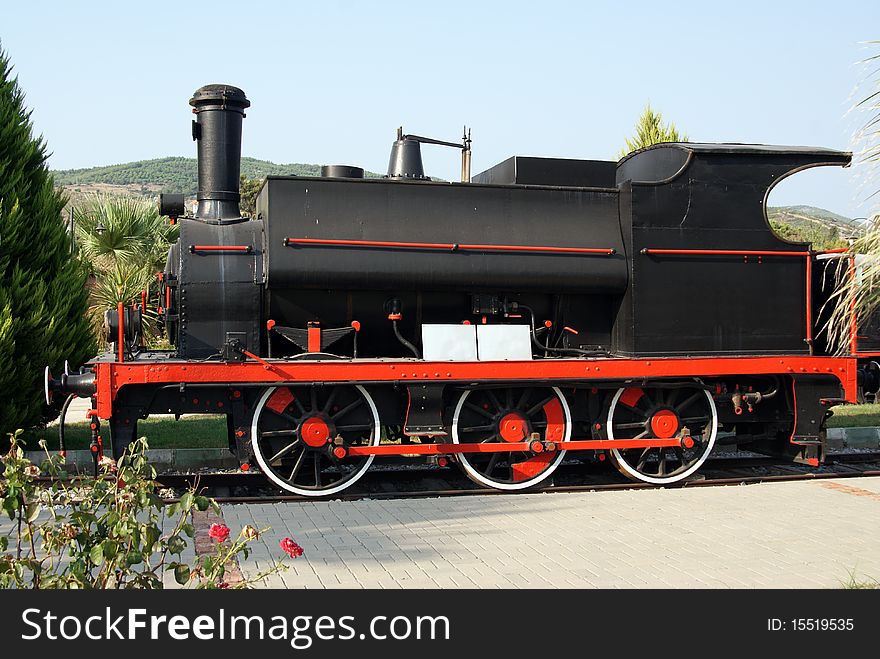 Old locomotive using steam power