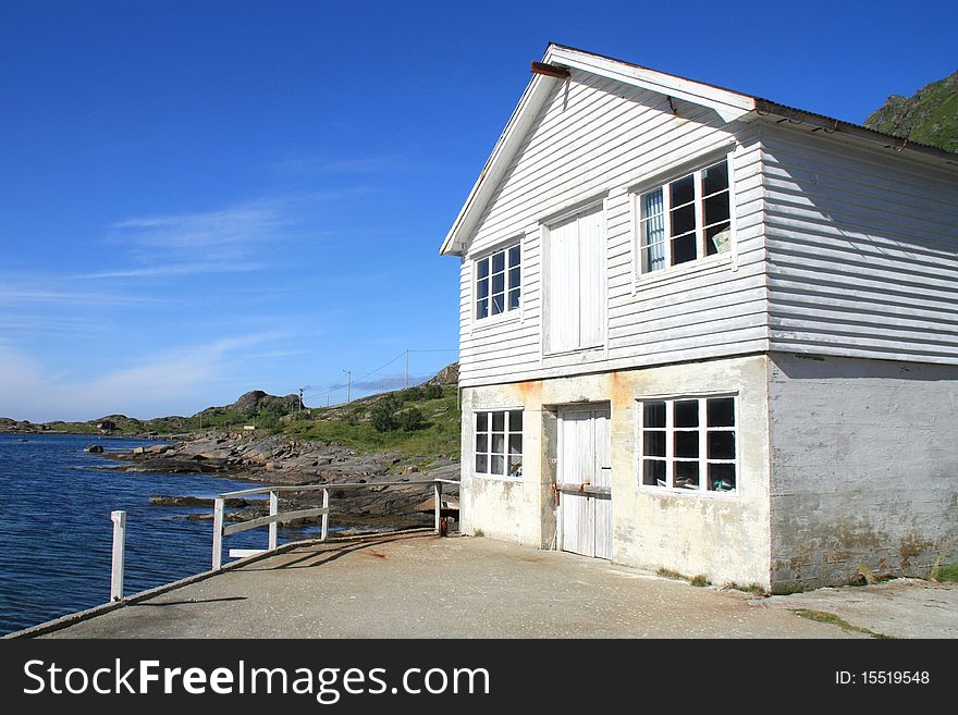 An  old traditional  house for fisherman in The fjord of Tangstad in  Lofoten islands,. An  old traditional  house for fisherman in The fjord of Tangstad in  Lofoten islands,