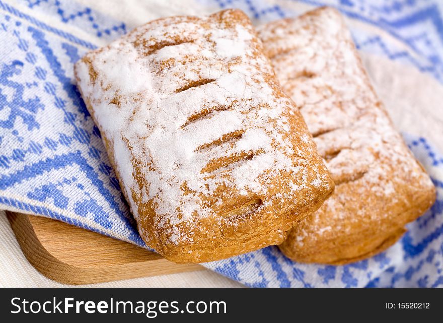 Two puff pastry with sugar powder