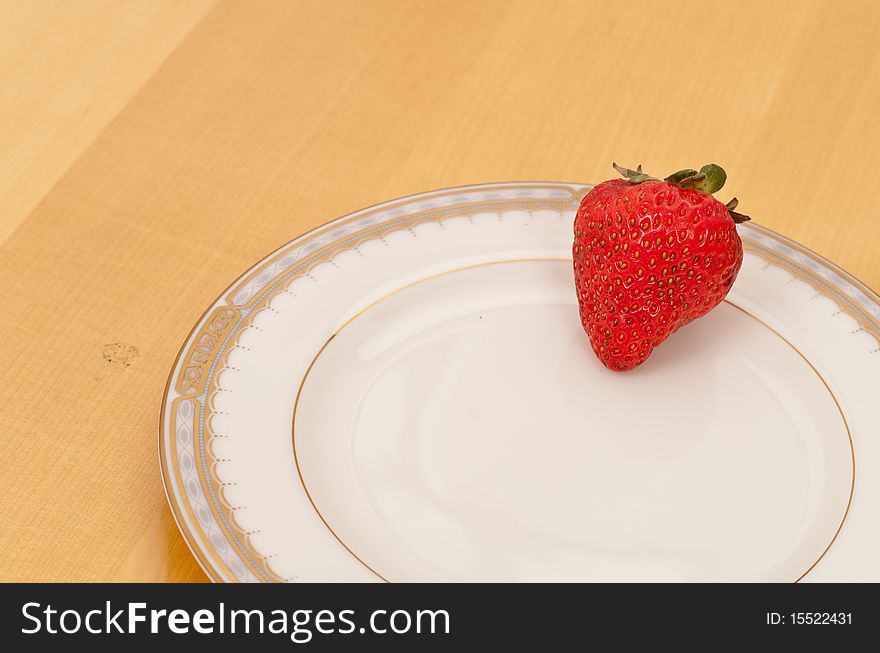 Strawberry on White Ceramic Plate ( Custom Space ). Strawberry on White Ceramic Plate ( Custom Space )