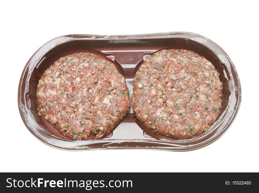 Raw Hamburgers In A Tray