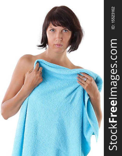 Portrait of sexy brunette woman with blue towel before spa treatment. Series. Portrait of sexy brunette woman with blue towel before spa treatment. Series