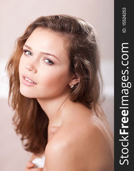 Closeup portrait of attractive caucasian young adult in bathroom. Closeup portrait of attractive caucasian young adult in bathroom