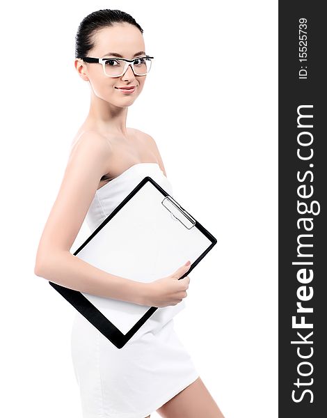 Beautiful young woman posing with worksheet. Isolated over white background.