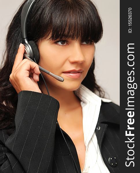 Young beautiful woman with headset
