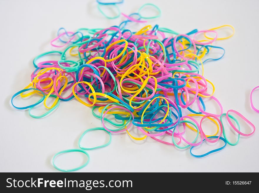 Colorful elastic rubber bands on white backgroud