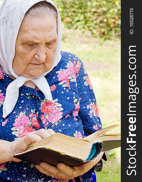 The old woman with the bible. The old woman with the bible