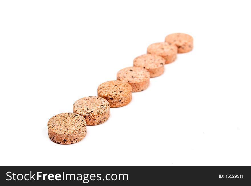 Vitamin tablets on a white background