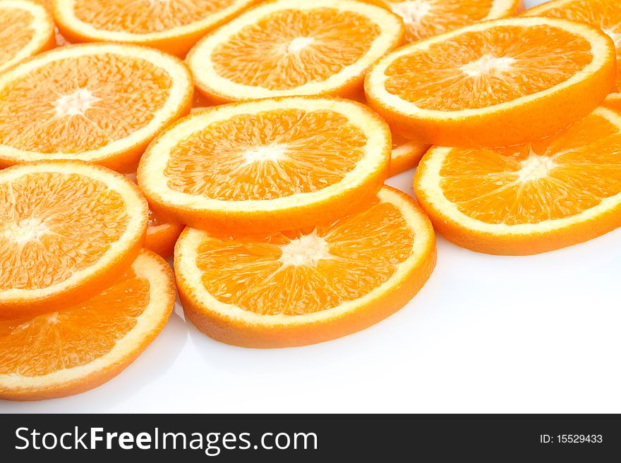 Orange slices on white background with space for text