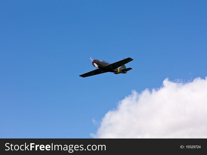 Airplane bearing Nazi german cross in the sky