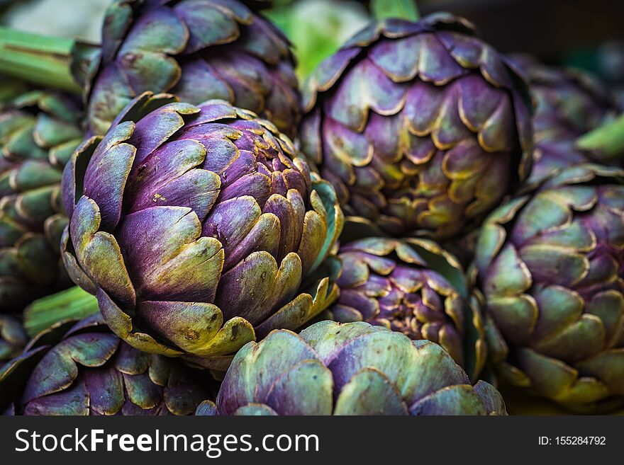 Fresh artichokes at farmers market.