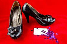 Black Shoes And Card On Red Background Stock Images Black Shoes And Card On Red Background Stock Images