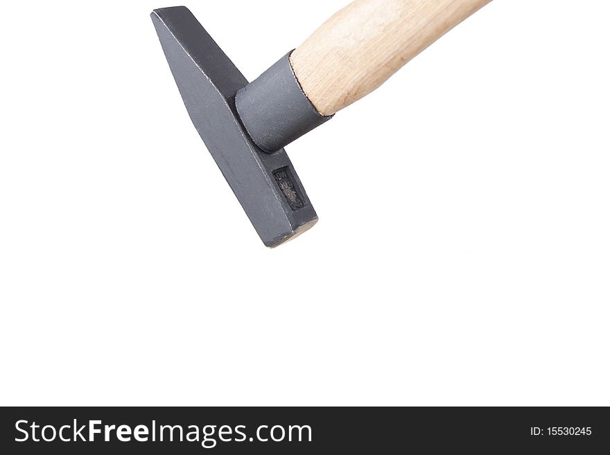 Simple construction combines steel with wood. Reliable timeless tool. Hammer on a white background.