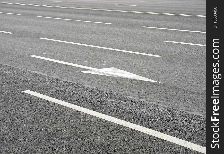 Arrow marks on a road. Arrow marks on a road