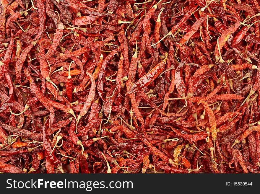 A layer of dried red chillies for background