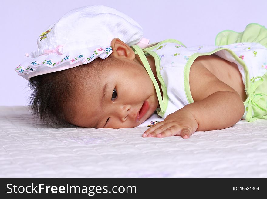 Cute asia baby will sleep.she is six month.