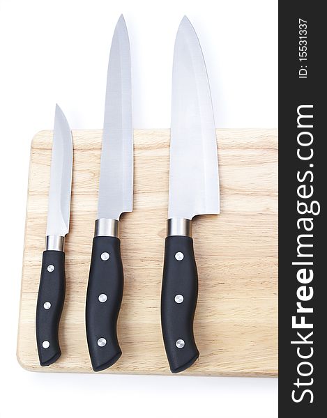 Cutting board with a knife isolated on a white background