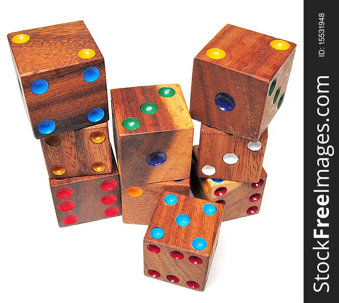 Group of nine wooden dices on white background