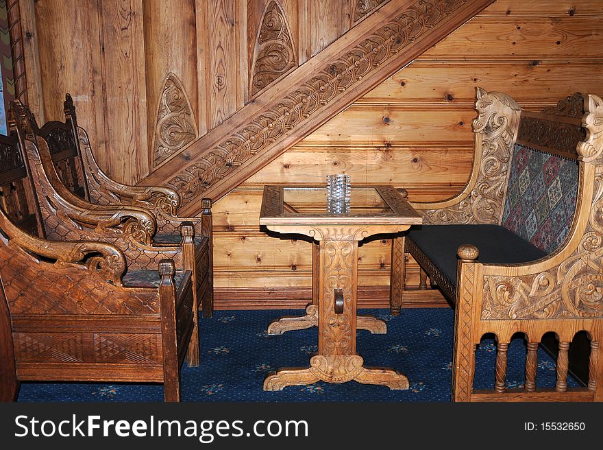 Ornate carved furniture in a bar in Balestrand. Ornate carved furniture in a bar in Balestrand