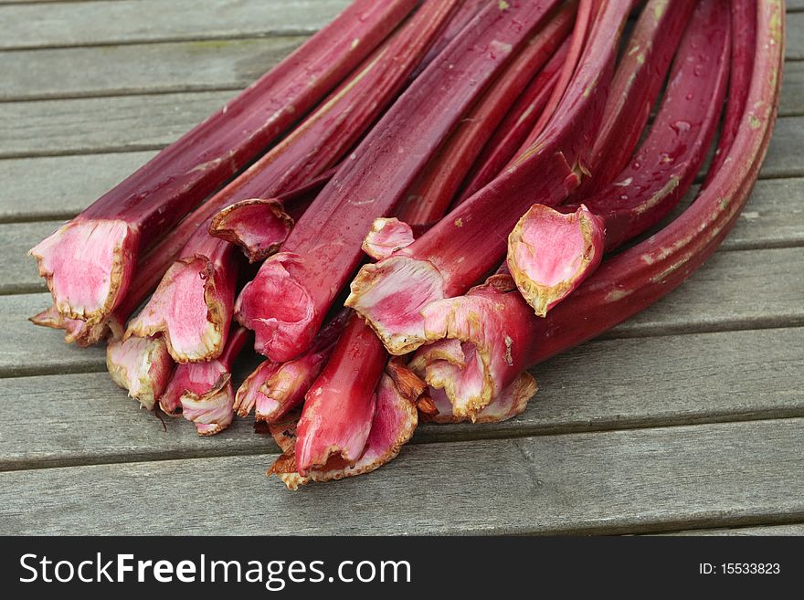 Freshly dug out rhubarb shoots closeup. Freshly dug out rhubarb shoots closeup