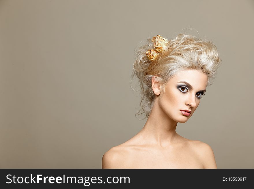 Portrait of beautiful blonde with a stylish hairdo. Portrait of beautiful blonde with a stylish hairdo
