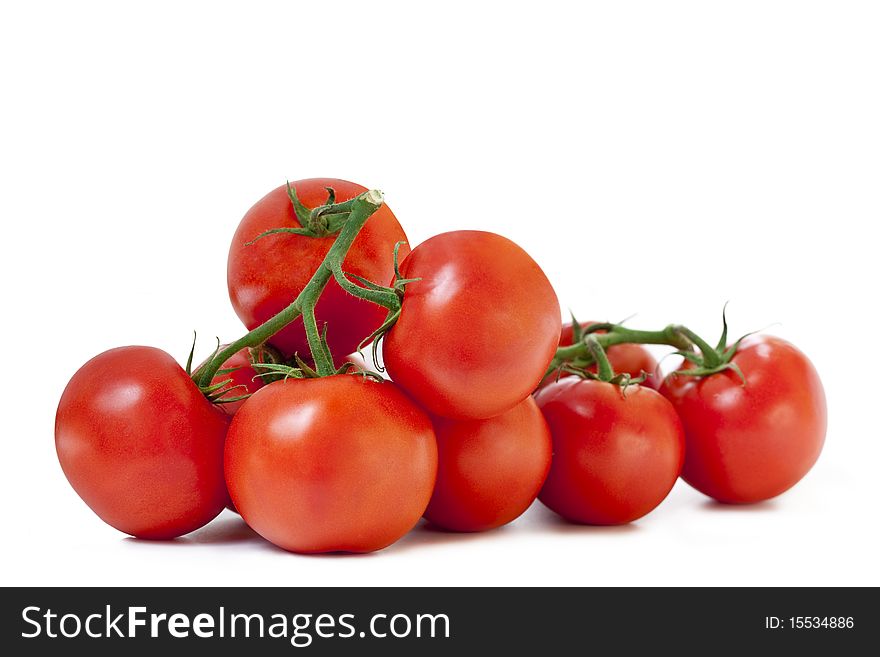 Group of ripe and juicy tomatoes isolated on white