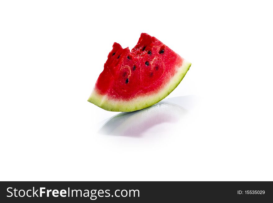 Little fresh juicy slice of watermelon isolated on white background. Little fresh juicy slice of watermelon isolated on white background