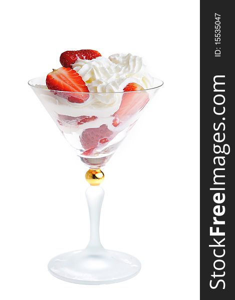 Fresh chopped strawberries with whipped cream in glasswares