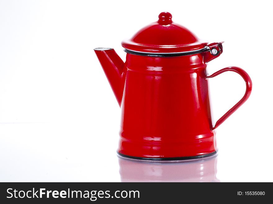 Red stylish metallic teapot isolated on white background. Red stylish metallic teapot isolated on white background