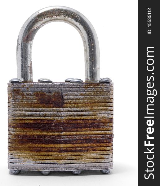 An old metal padlock on a white background