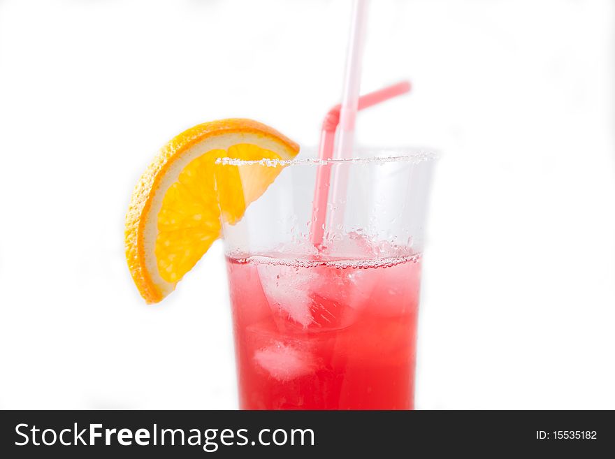 Glass of red juice with a straw and orange. Glass of red juice with a straw and orange