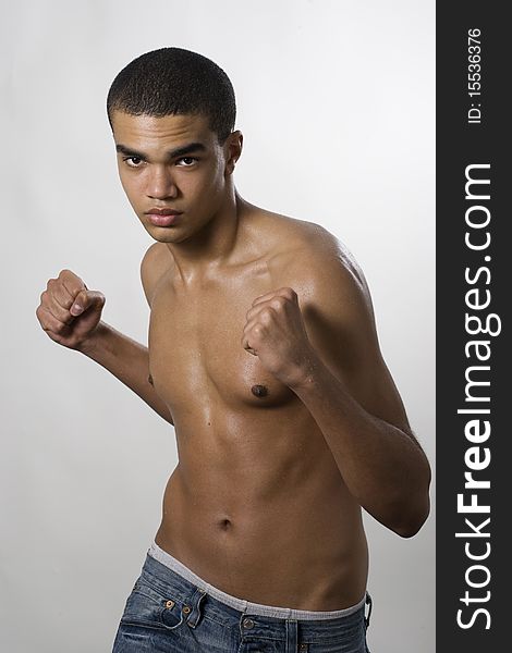 Young handsome african-american fighter. Young handsome african-american fighter