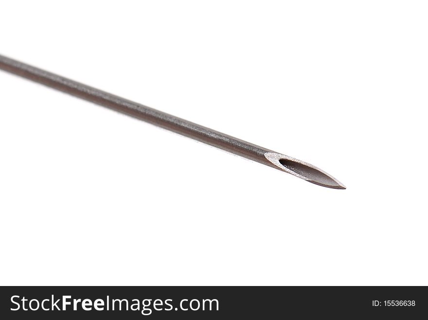 Macro photo of a syringe needle isolated